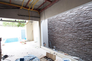 Master bedroom after wall tiling